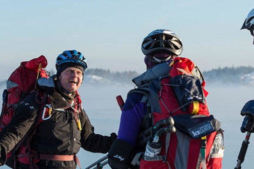a group of people that are standing in the snow