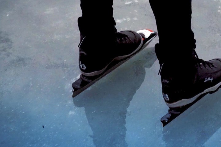 a pair of feet on a snow board